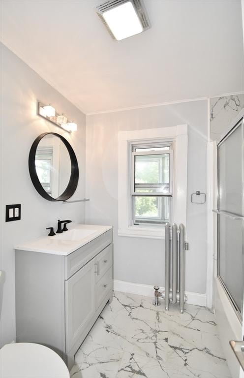 176 N Blvd, West Springfield, MA 01089 - full bath featuring vanity, marble finish flooring, combined bath / shower with glass door, and radiator