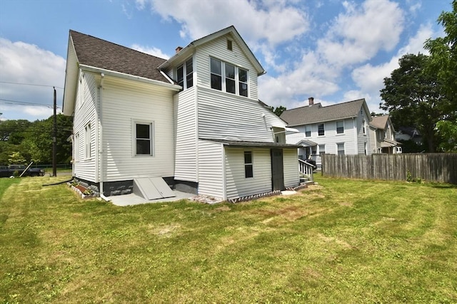 176 N Blvd, West Springfield, MA 01089 - rear view of property featuring a chimney