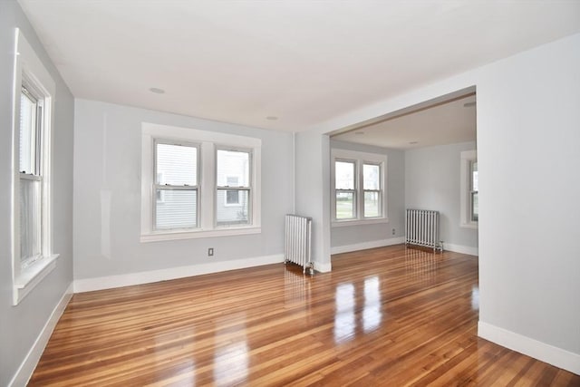176 N Blvd, West Springfield, MA 01089 - spare room featuring radiator and wood finished floors