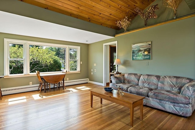living room featuring a baseboard heating unit, plenty of natural light, wooden ceiling, wood finished floors, and vaulted ceiling