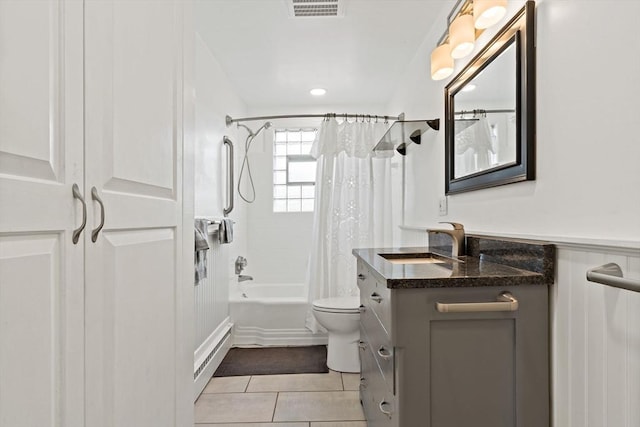 full bath with tile patterned flooring, vanity, shower / bathtub combination with curtain, and toilet