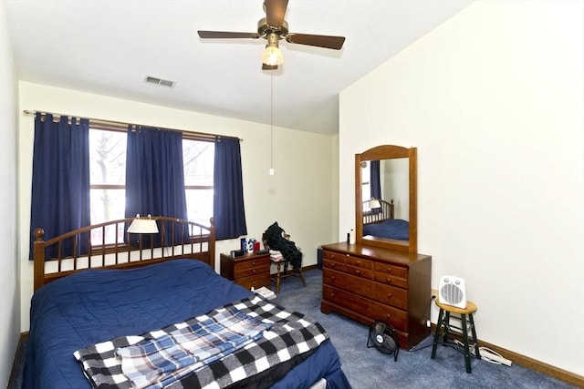 bedroom with ceiling fan, carpet, visible vents, and baseboards