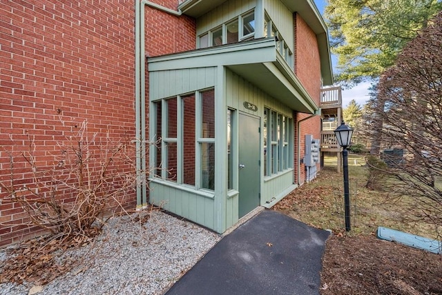 view of home's exterior featuring brick siding