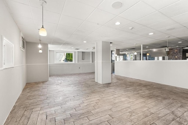 basement with wood finished floors and recessed lighting