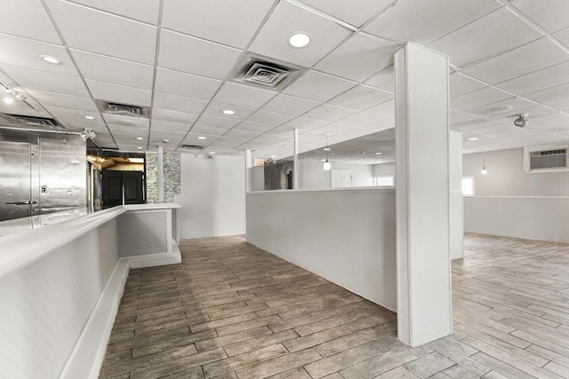view of community with recessed lighting