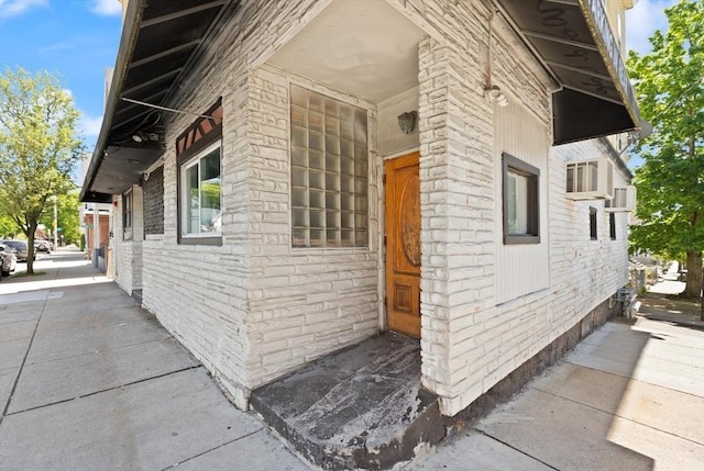 view of home's exterior featuring brick siding