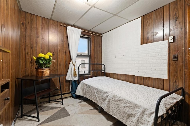 bedroom with wooden walls