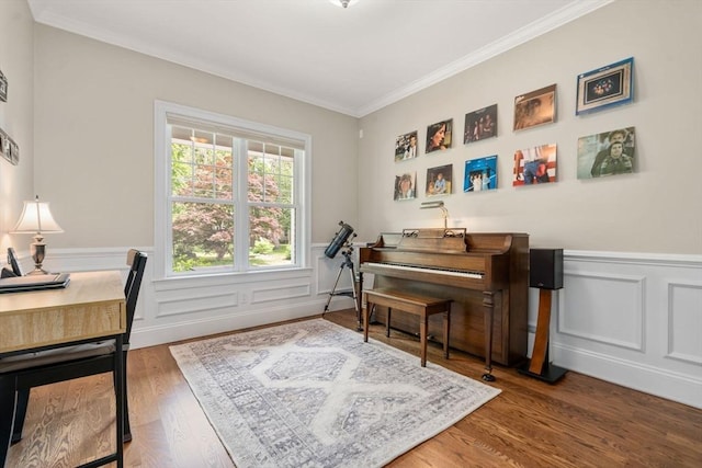 16 Winfield St, Needham, MA 02492 - home office with ornamental molding, wainscoting, wood finished floors, and a decorative wall