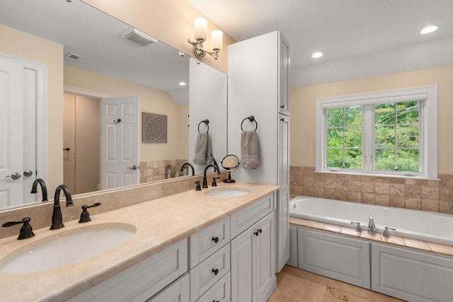 16 Winfield St, Needham, MA 02492 - full bathroom with a bath, double vanity, tile patterned flooring, and recessed lighting