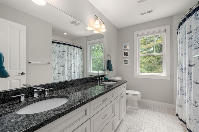 16 Winfield St, Needham, MA 02492 - full bathroom featuring double vanity and a shower with curtain