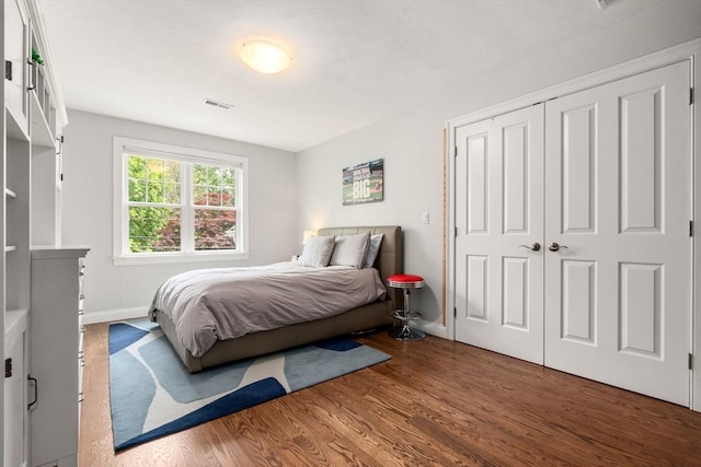 16 Winfield St, Needham, MA 02492 - bedroom with wood finished floors and a closet
