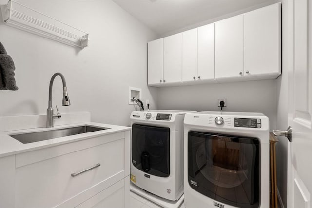 16 Winfield St, Needham, MA 02492 - laundry area featuring cabinet space and separate washer and dryer
