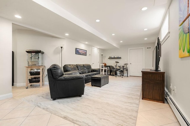 16 Winfield St, Needham, MA 02492 - living room featuring baseboard heating, light tile patterned flooring, and recessed lighting