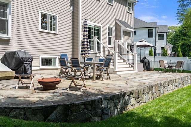 16 Winfield St, Needham, MA 02492 - view of patio featuring a fire pit and area for grilling
