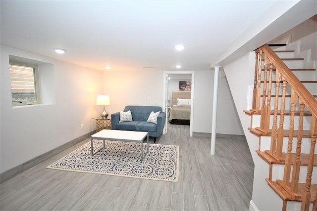 318 Concord Ave Unit 1, Cambridge, MA 02138 - living area featuring baseboards, wood finished floors, stairway, and recessed lighting