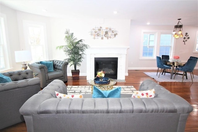 318 Concord Ave Unit 1, Cambridge, MA 02138 - living area with a chandelier, wood finished floors, recessed lighting, baseboards, and a high end fireplace