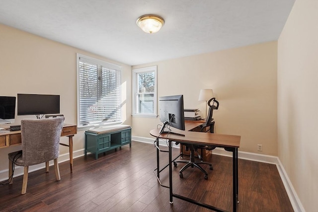 office area featuring baseboards and dark wood-type flooring