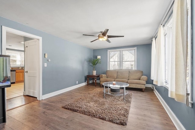 living area featuring wood finished floors and a wealth of natural light