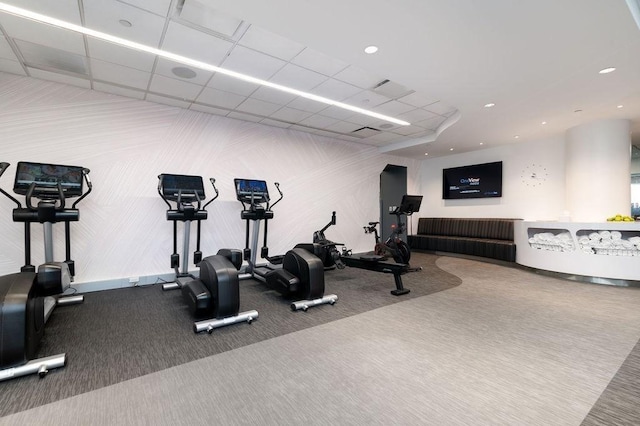 workout area featuring carpet flooring