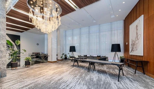 community lobby featuring wooden walls