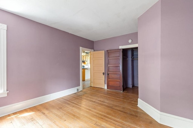 128 7th St, Montague, MA 01376 - unfurnished bedroom with baseboards, light wood finished floors, and a closet