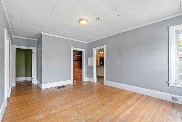 128 7th St, Montague, MA 01376 - empty room featuring light wood-style floors, crown molding, baseboards, a ceiling fan, and a pendent fire sprinkler