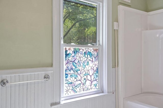 128 7th St, Montague, MA 01376 - bathroom featuring wainscoting and a bath