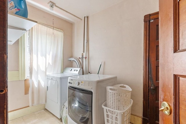 128 7th St, Montague, MA 01376 - laundry area with washing machine and dryer and baseboards