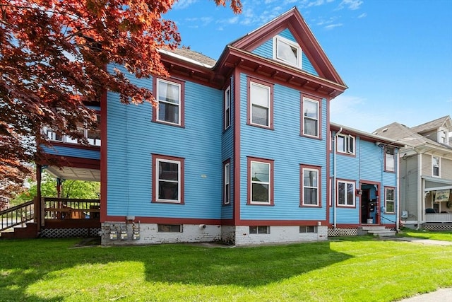 128 7th St, Montague, MA 01376 - rear view of house featuring a yard