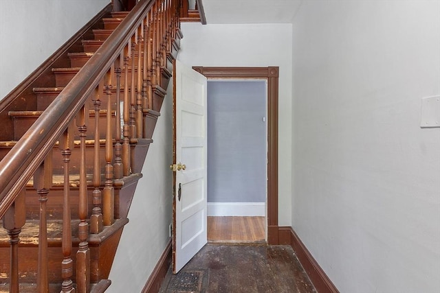 128 7th St, Montague, MA 01376 - stairs featuring wood finished floors and baseboards