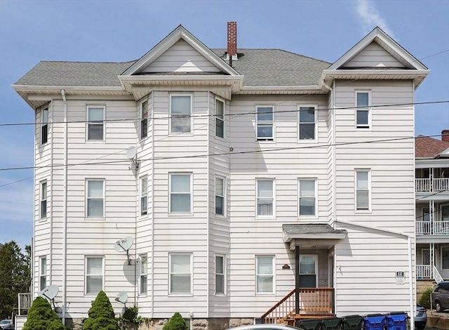 168 Forest St, Fall River, MA 02721 - view of front of house with a chimney