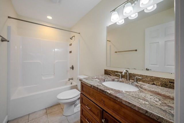 full bath with bathing tub / shower combination, vanity, toilet, and tile patterned floors