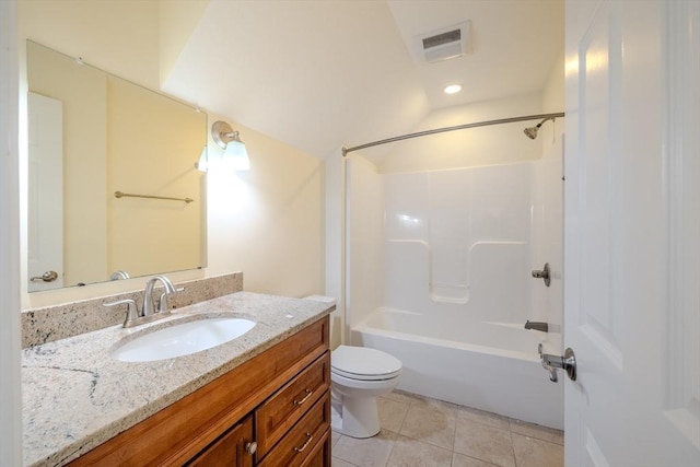 full bathroom with visible vents, toilet, tile patterned floors, vanity, and washtub / shower combination