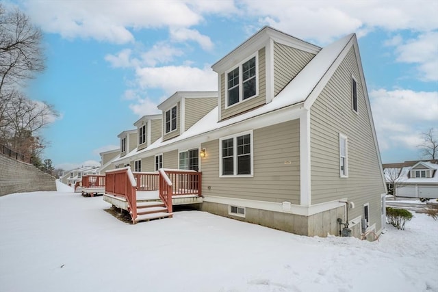 view of front of house featuring a wooden deck