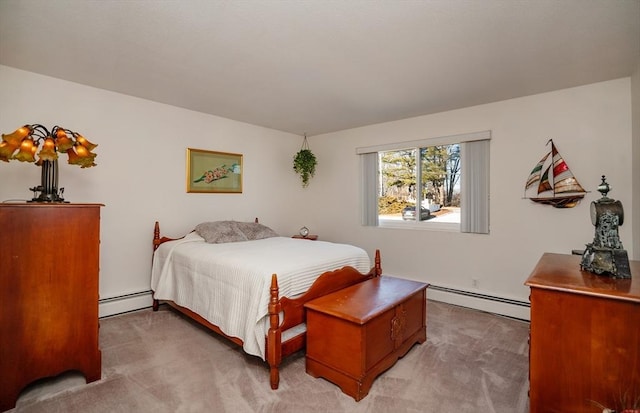 carpeted bedroom featuring a baseboard radiator