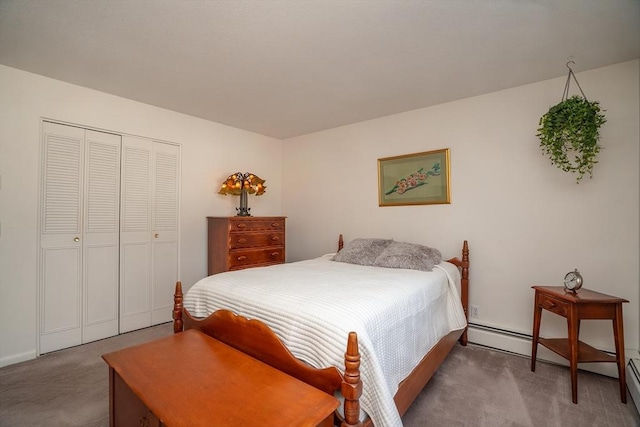 bedroom featuring a baseboard radiator, carpet, and a closet