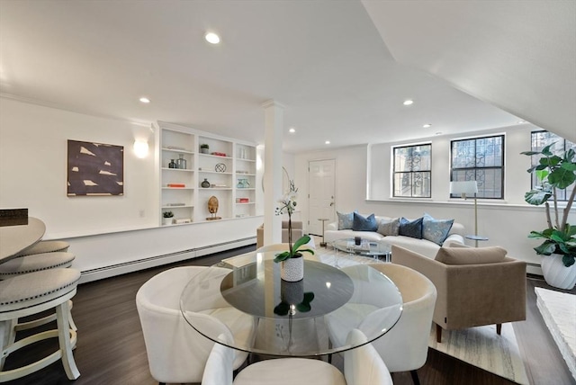 dining space with recessed lighting, a baseboard radiator, a baseboard heating unit, and dark wood-style flooring