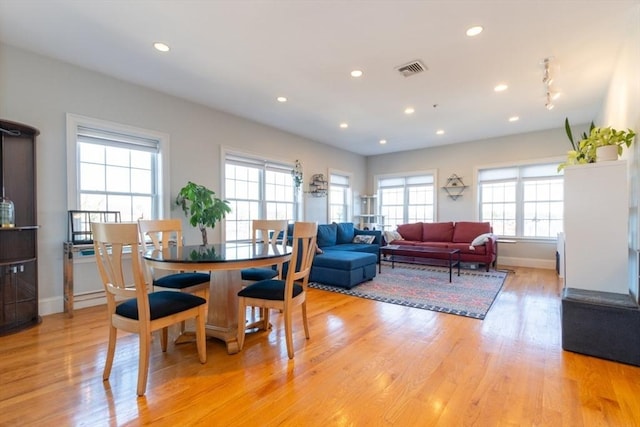 dining area with recessed lighting, visible vents, baseboards, and light wood-style floors