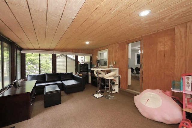 34 Pinecrest Rd, West Bridgewater, MA 02379 - living room with wood ceiling, carpet flooring, wooden walls, and recessed lighting