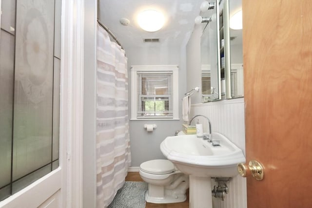 34 Pinecrest Rd, West Bridgewater, MA 02379 - full bathroom with toilet, curtained shower, and wood finished floors
