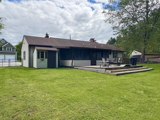 34 Pinecrest Rd, West Bridgewater, MA 02379 - back of house with a chimney, roof with shingles, and a wooden deck