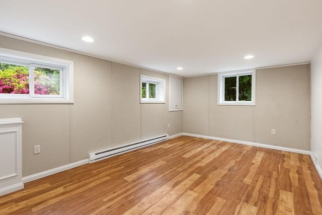 46 Blackmer, Sudbury, MA 01776 - below grade area with baseboard heating, light wood-style floors, baseboards, and recessed lighting