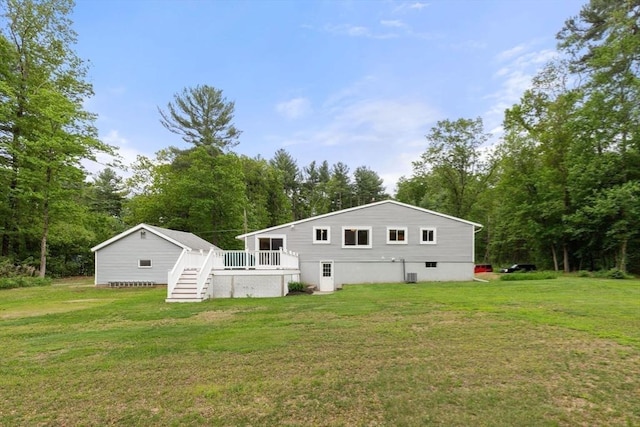 46 Blackmer, Sudbury, MA 01776 - rear view of property with a wooden deck, stairs, a yard, and central AC