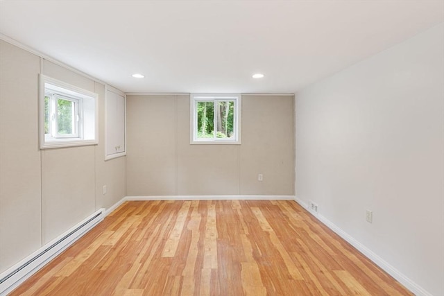46 Blackmer, Sudbury, MA 01776 - spare room featuring a baseboard heating unit, healthy amount of natural light, light wood-style floors, baseboards, and recessed lighting