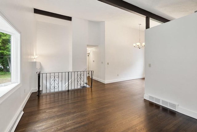46 Blackmer, Sudbury, MA 01776 - unfurnished room with a baseboard heating unit, a chandelier, beam ceiling, wood finished floors, and baseboards