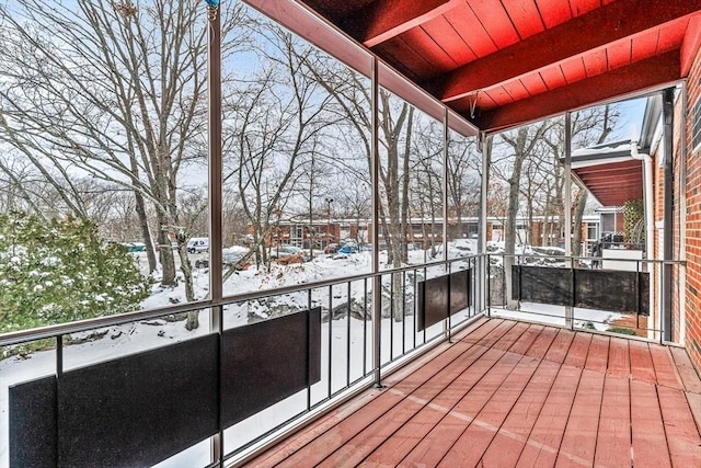 view of snow covered deck