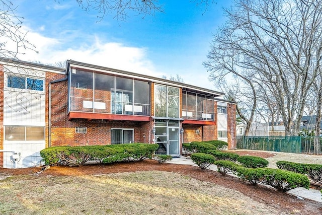 view of property featuring fence