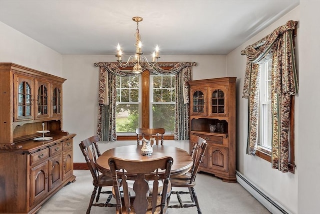 74 W Main St, Westminster, MA 01473 - dining room with a chandelier, a baseboard heating unit, healthy amount of natural light, and light colored carpet