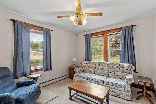 74 W Main St, Westminster, MA 01473 - living area with a baseboard heating unit, healthy amount of natural light, light colored carpet, and ceiling fan