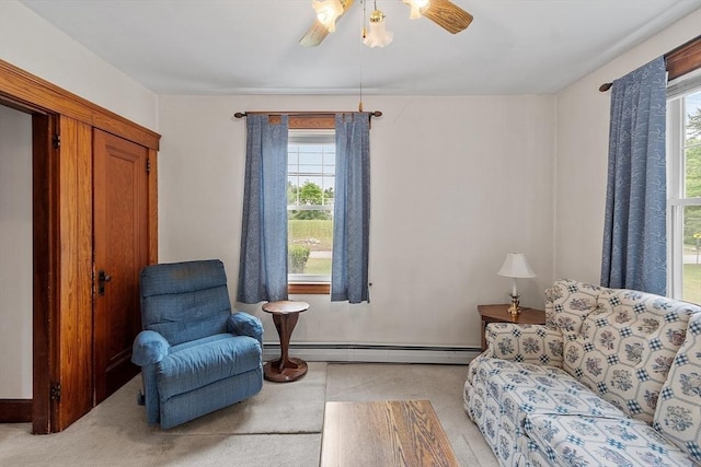 74 W Main St, Westminster, MA 01473 - sitting room featuring plenty of natural light, a ceiling fan, baseboard heating, and carpet flooring